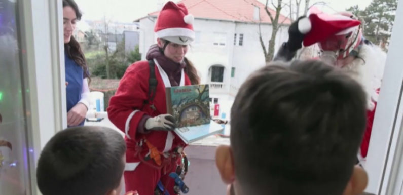 Санты-альпинисты поздравили детей в больницах